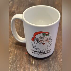 EUC funny Santa Look Human coffee mug.  Very sturdy.